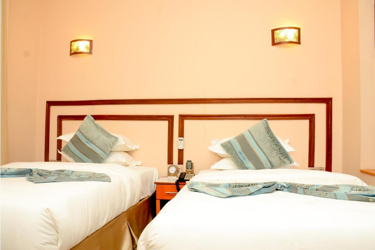 Kim Hotel Кигали Екстериор снимка